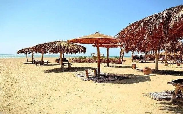 Wooden jetty and beach at Mahmya on Giftun Kebir