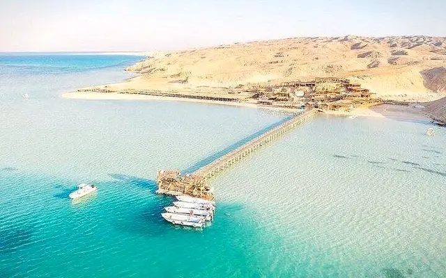 Aerial view of the Orange Bay jetty and turquoise lagoon on Giftun Island